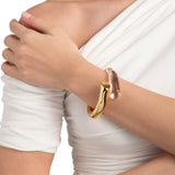 Liquid Lucite Bypass
Hinge Bracelet 14k Gold Plated Brass, Clear Lucite