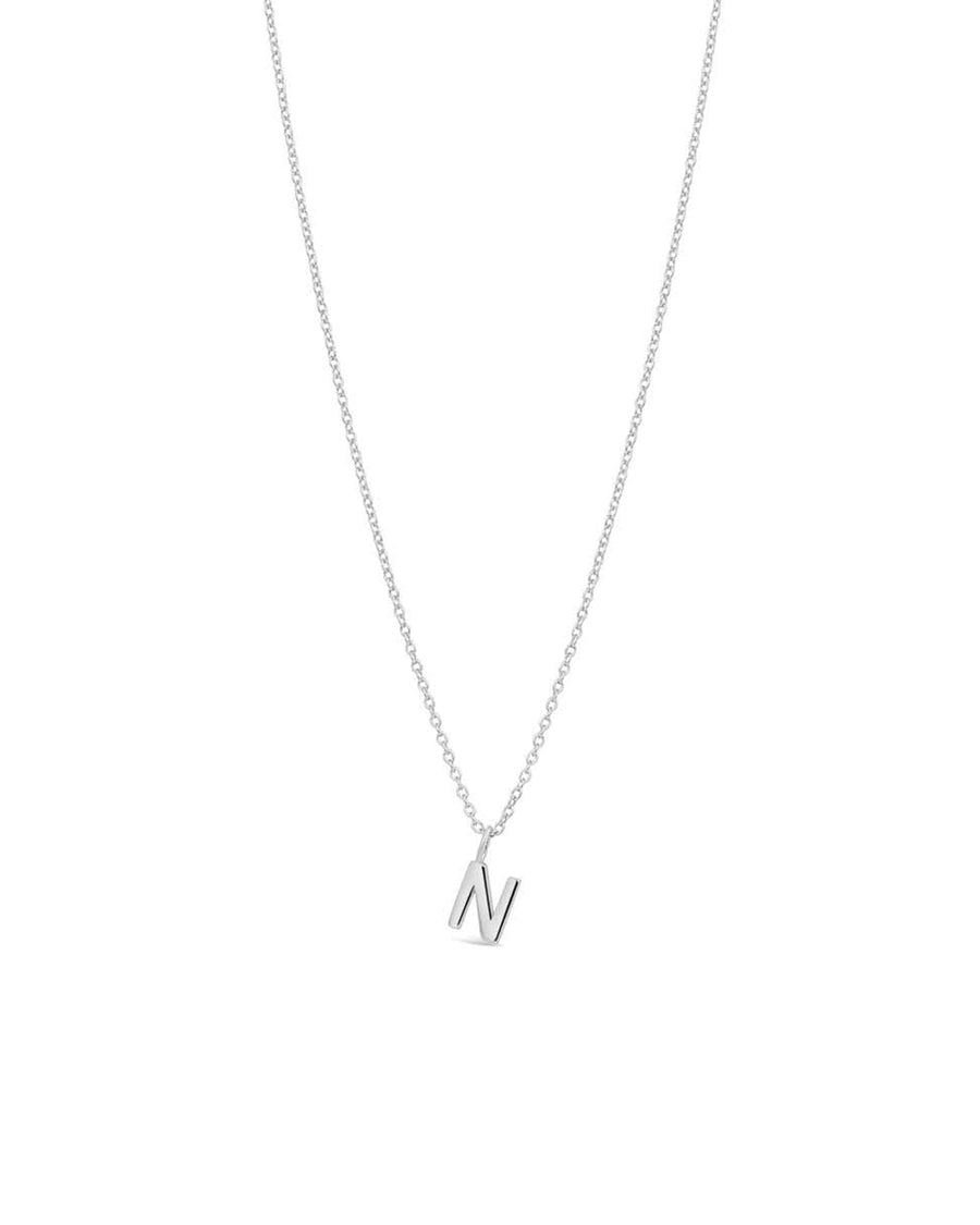 https://www.blueruby.com/cdn/shop/files/initial-necklace-quiet-icon-necklaces-rhodium-plated-sterling-silver-n-blue-ruby-jewellery-284411-11_900x.jpg?v=1698711965